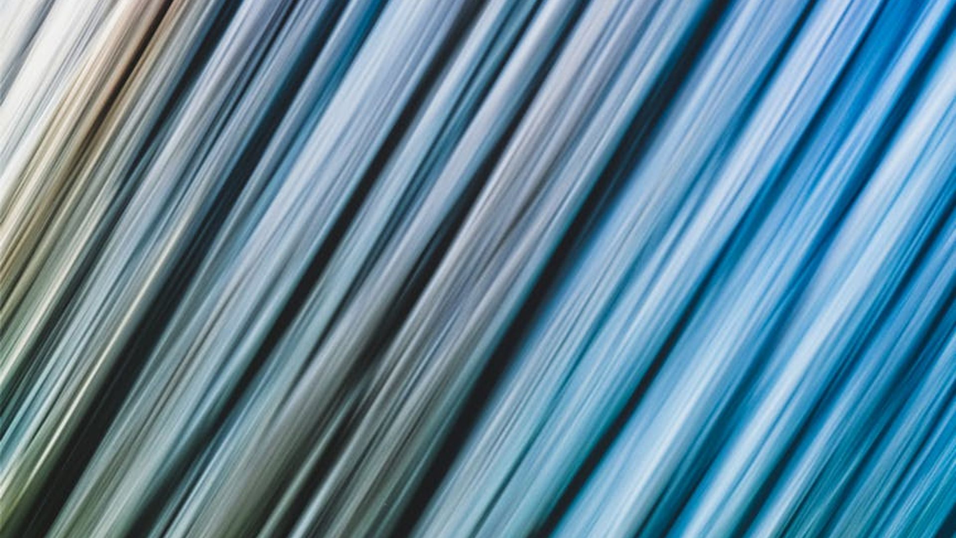 Abstract background with soft, flowing lines suggesting movement and rhythm.